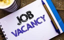 Conceptual hand writing showing Job Vacancy. Business photo showcasing Work Career Vacant Position Hiring Employment Recruit Job written on Notebook Book on the jute background Pen and Cup